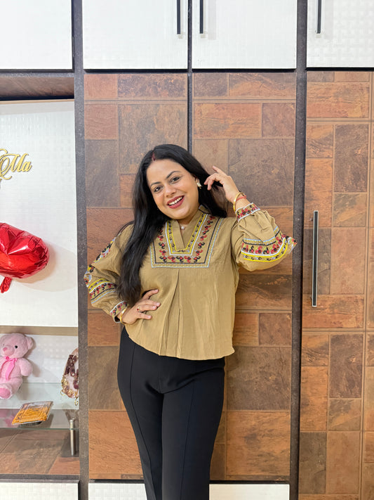 Embroidered Peplum Top